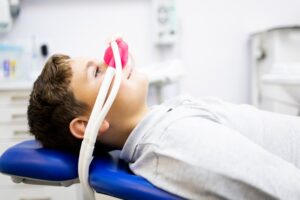 a child receiving nitrous oxide dental sedation